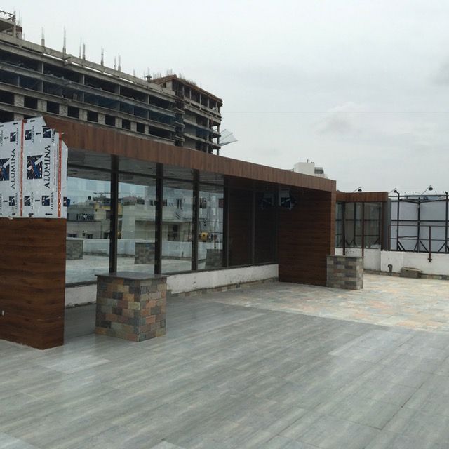 Gachibowli commercial building, Design Cell Int Design Cell Int Ticari alanlar Ahşap-Plastik Kompozit Oteller