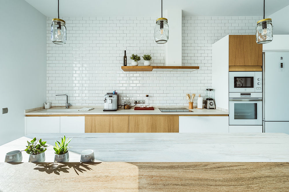 Cocina nórdica en Toledo OOIIO Arquitectura Cocinas de estilo moderno Madera Acabado en madera