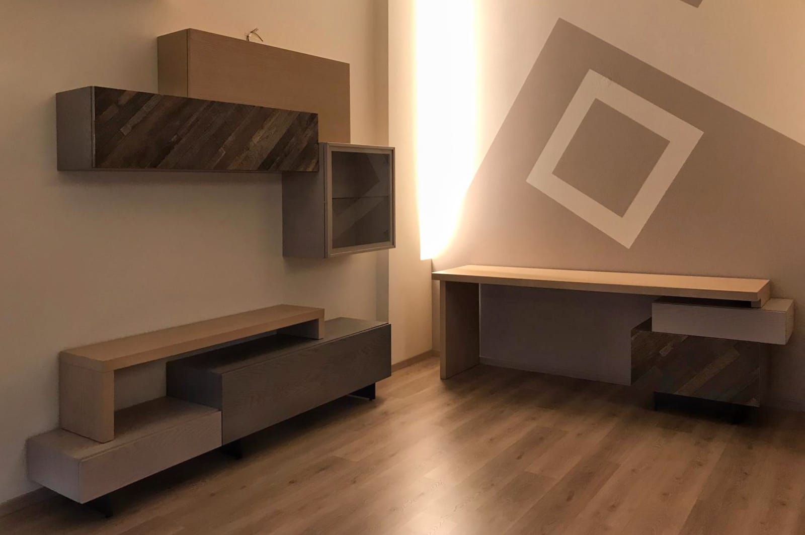 Un soggiorno moderno con angolo studio, Idea Stile Idea Stile Livings de estilo moderno Madera maciza Multicolor