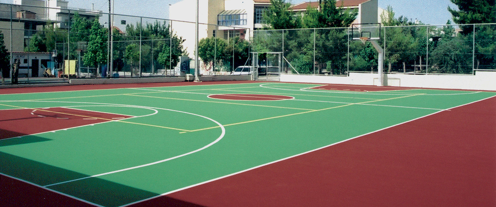 CANCHA DE CAUCHO IN SITU ACG Construcciones Pisos