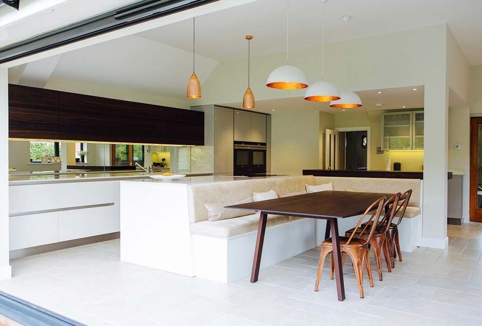 Island with integrated bench seating WALK INTERIOR ARCHITECTURE + DESIGN Modern kitchen