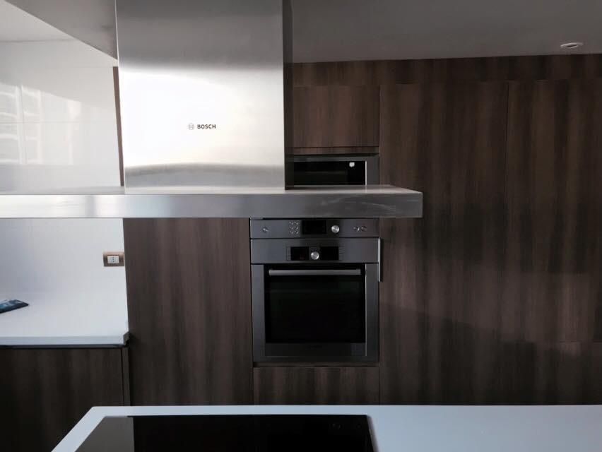 Remodelación de Cocina en Santiago, AUTANA estudio AUTANA estudio Built-in kitchens لکڑی Wood effect