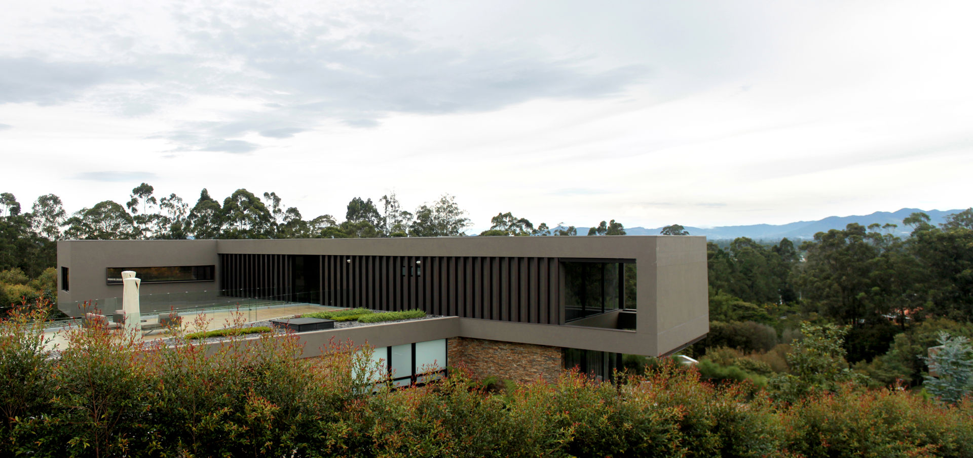 CASA C4, BASSICO ARQUITECTOS BASSICO ARQUITECTOS Casas familiares