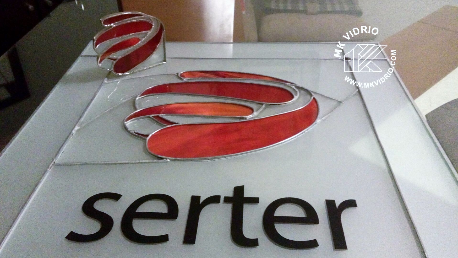 Logo SERTER MKVidrio Espacios comerciales Vidrio logo en vidrio,serter,anuncio en vidrio,imagen en vidrio,luz y color,Oficinas y tiendas