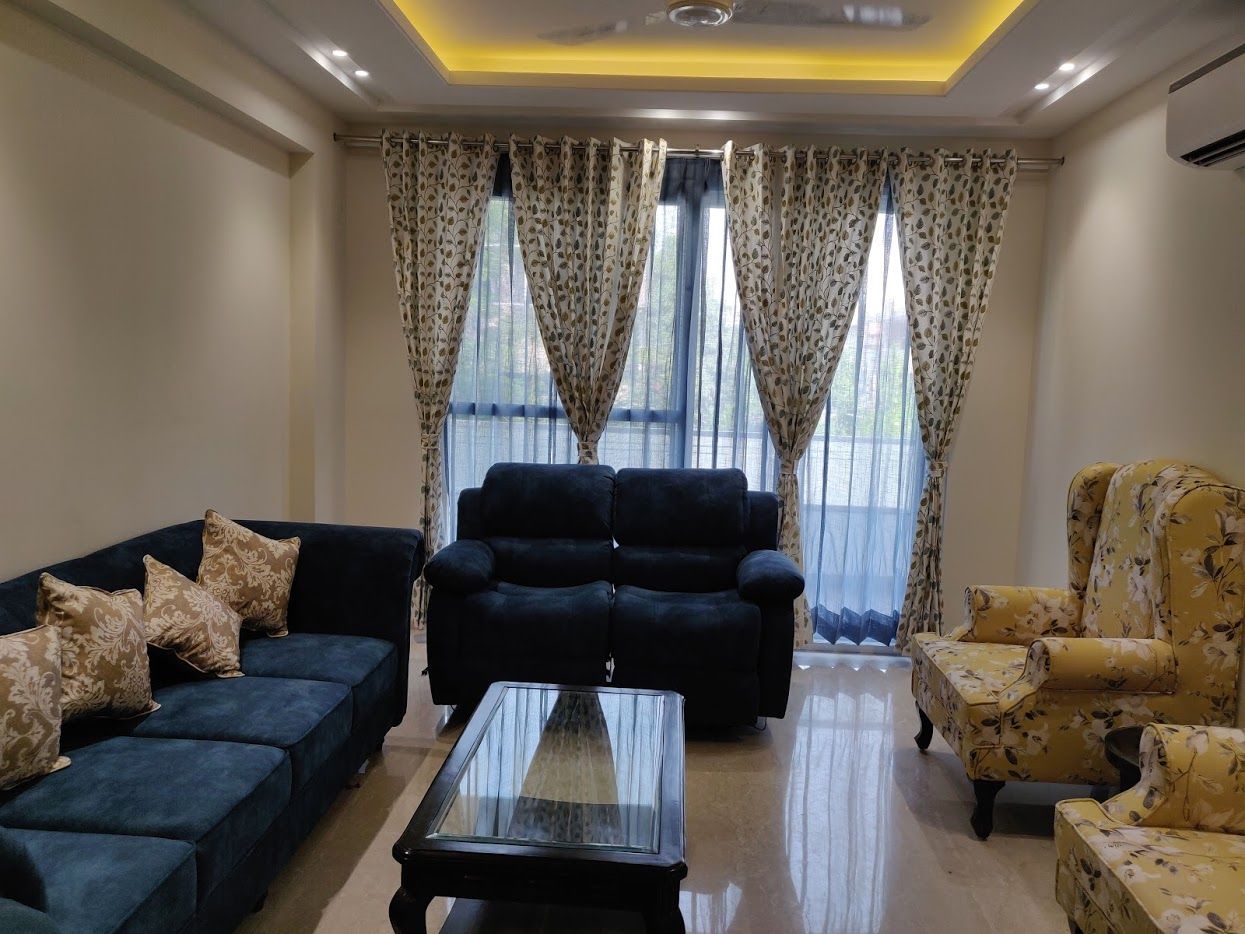 Drawing room, Design Kreations Design Kreations ห้องนั่งเล่น สิ่งทอ Amber/Gold โซฟาและเก้าอี้นวม