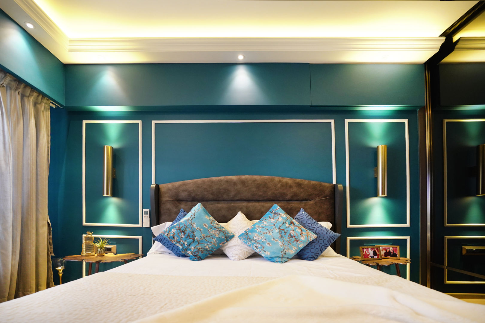A cozy bedroom in blue HomeLane.com Small bedroom