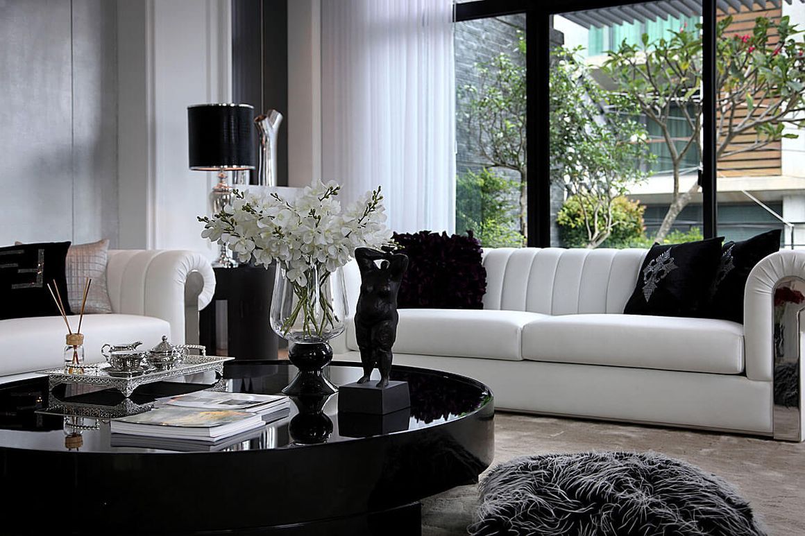 大砌的原型茶几搭配花藝擺飾 大桓設計顧問有限公司 Classic style living room