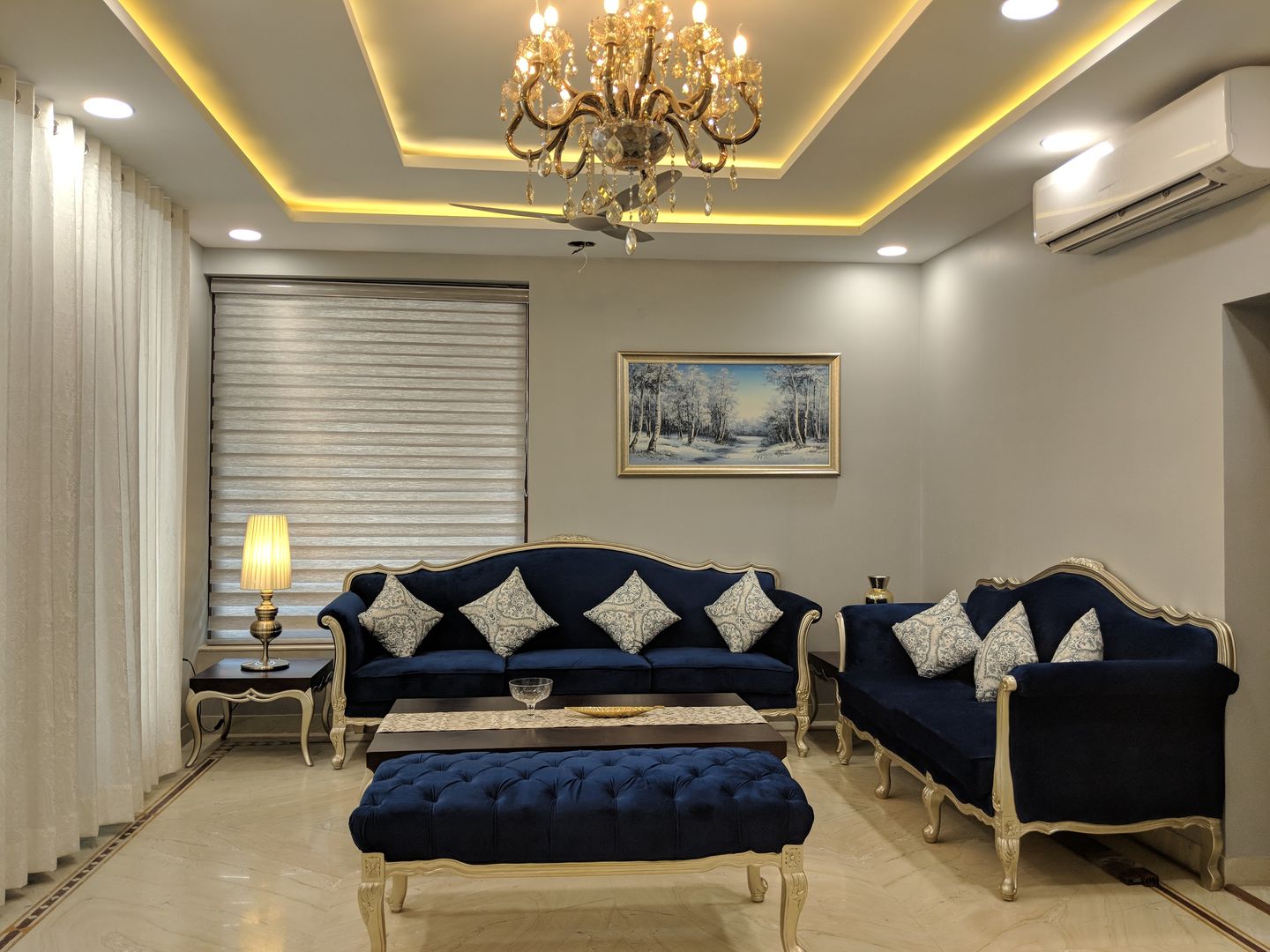 living room ceiling design furniture placement and wall design - GharExpert