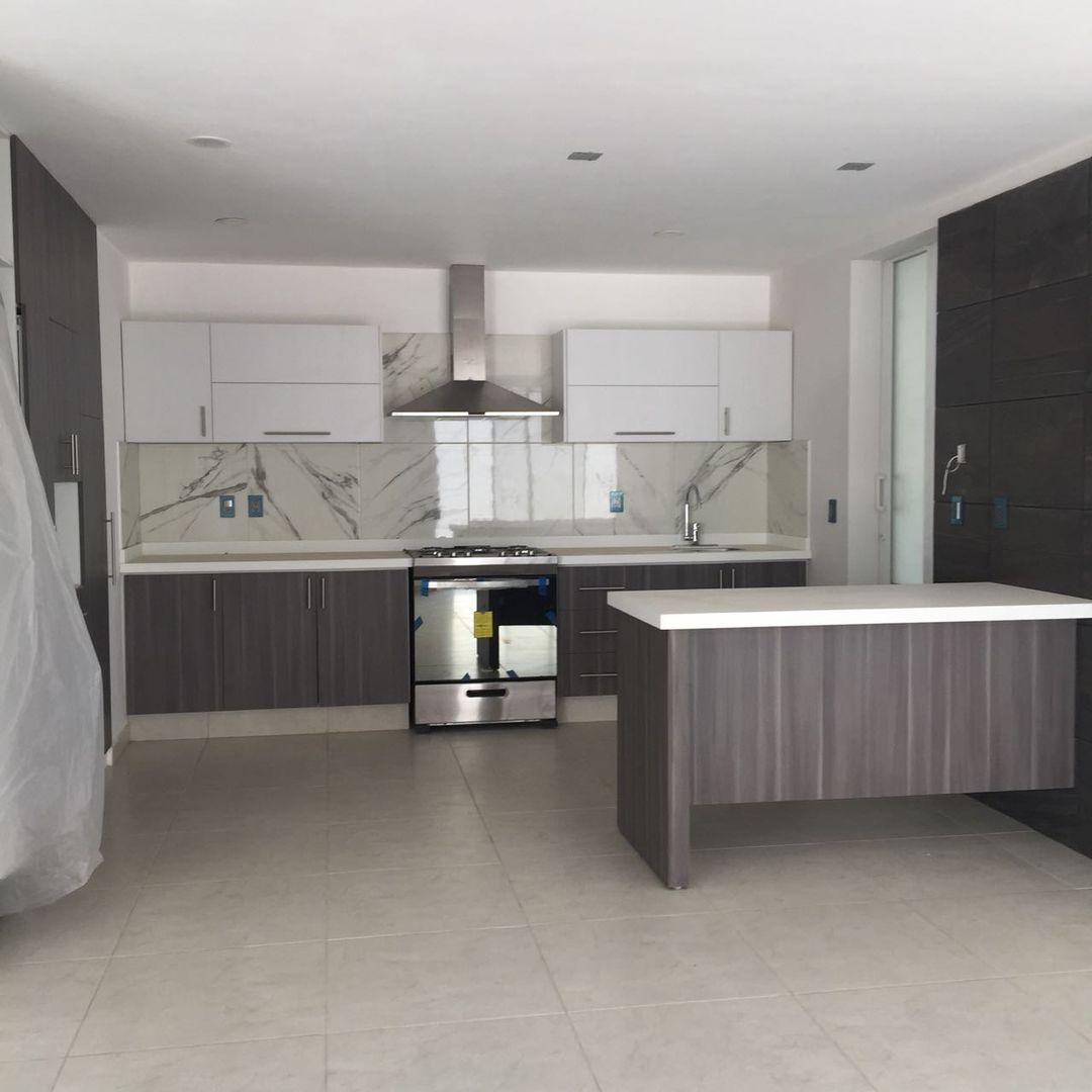 RESIDENCIAL HUAMUCHE, Ideas Arquitectónicas Ideas Arquitectónicas Built-in kitchens Wood Wood effect