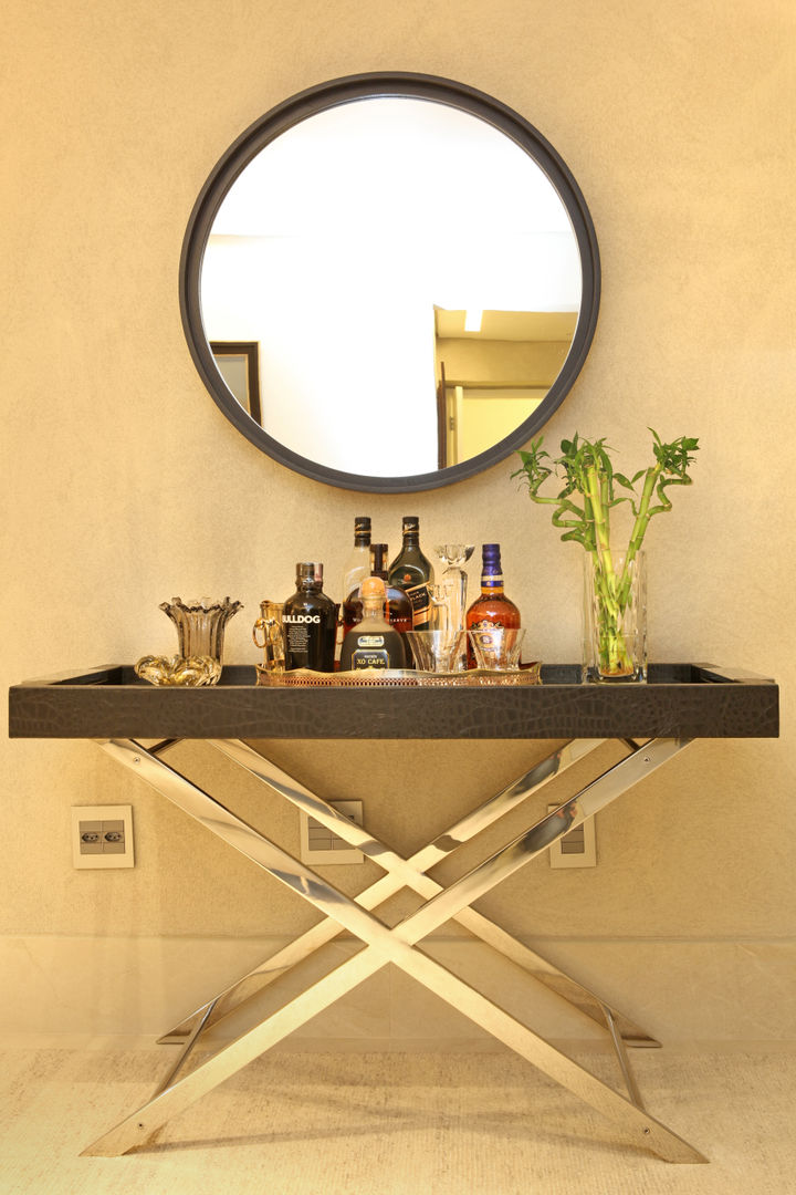 Sala Célia Orlandi por Ato em Arte Salas de estar modernas aparador,espelho,aço,couro,preto,moldura,sala