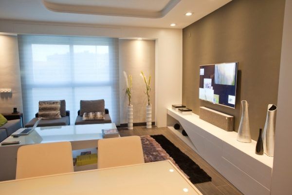 Hogar inteligente con diseño minimalista , Domonova Soluciones Tecnológicas Domonova Soluciones Tecnológicas Modern living room