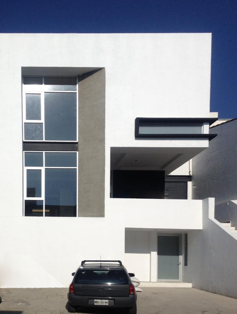 CASA LANCE, Arqcubo Arquitectos Arqcubo Arquitectos บ้านและที่อยู่อาศัย คอนกรีต