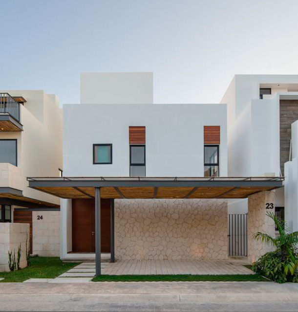 Casa Kuxtal AIM arquitectura inmobiliaria Casas de estilo moderno