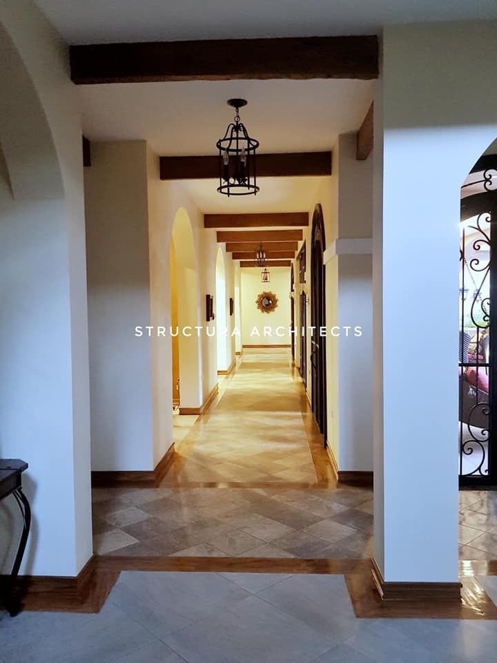 Hallway - Protects the house's interiors from direct sunlight Structura Architects Mediterranean style corridor, hallway and stairs Tiles