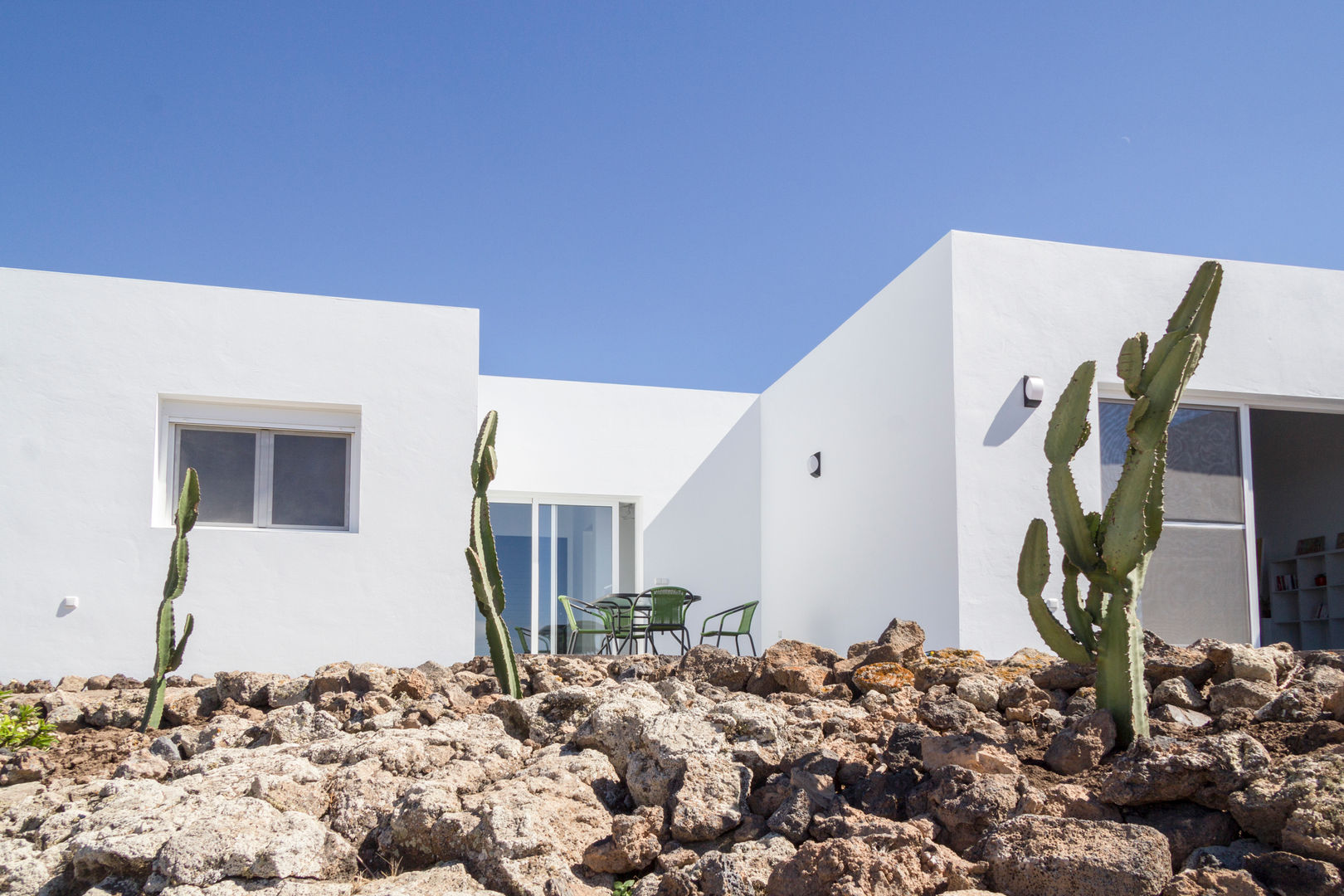 Vivienda con piscina, TZ-Arquitectura TZ-Arquitectura Rock Garden