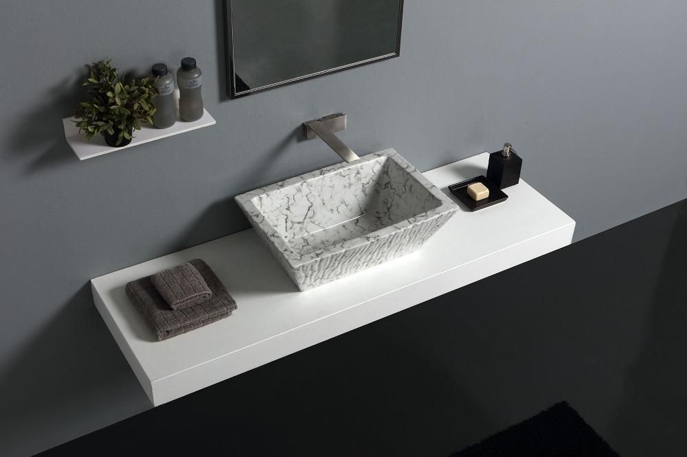 Un lavabo in ceramica con una finitura marmorea che dona eleganza ed originalità ad ogni bagno, Horganica Horganica Casas de banho rústicas Cerâmica Pia