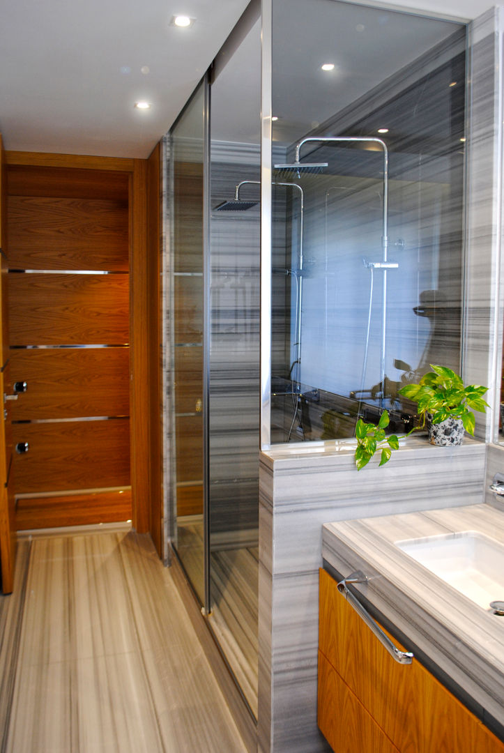 Baño en suite de aire minimalista y elegante MANUEL TORRES DESIGN Baños de estilo ecléctico Mármol Bañeras y duchas