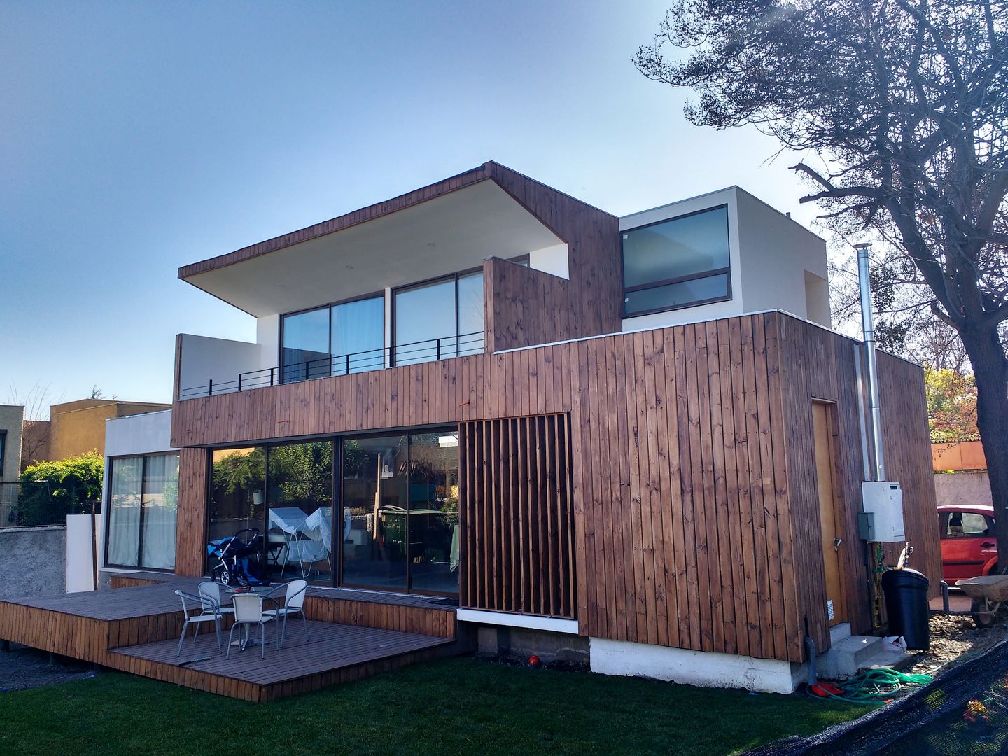 Fachada Sur Martin Rojas Arquitectos Asoc. Chalets Madera Acabado en madera Casas Mediterraneas