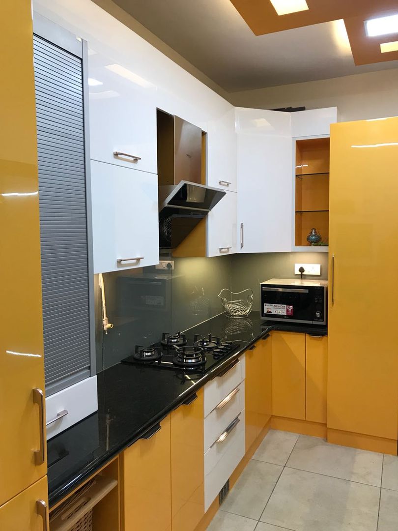 L-shaped Kitchen with Roller shutter and Tall Unit 12 Square Interiors Kitchen units Plywood Yellow, white, kitchen, Polycoat, paint finish, vibrant, modern, Roller shutter, Tall Unit, Pantry unit