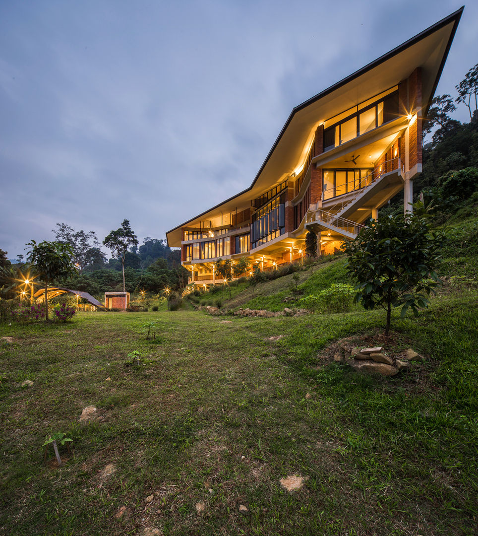 Evening view MJ Kanny Architect Tropical style houses