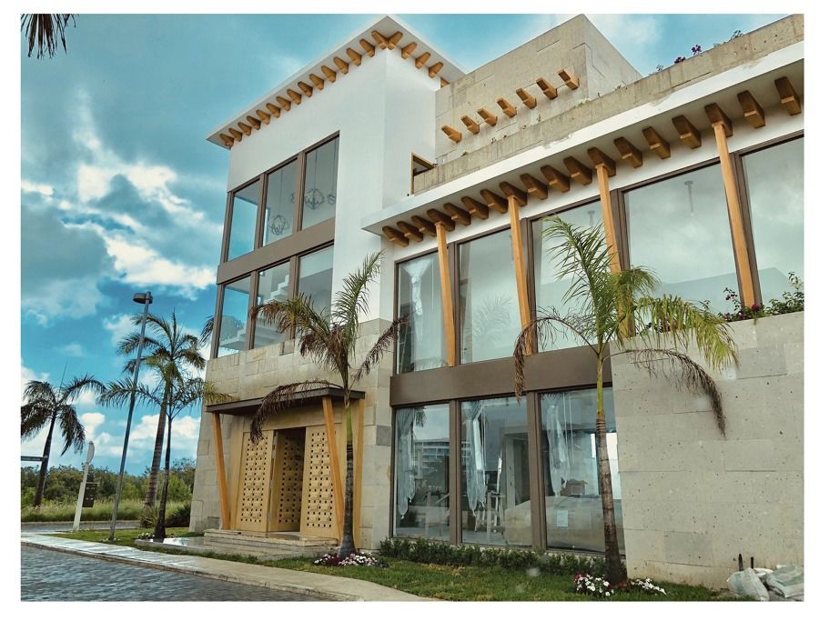 Residencial Laguna Puerto Cancun, Proyecto de construcción , Loft212architecture & Construction Loft212architecture & Construction Villas Stone