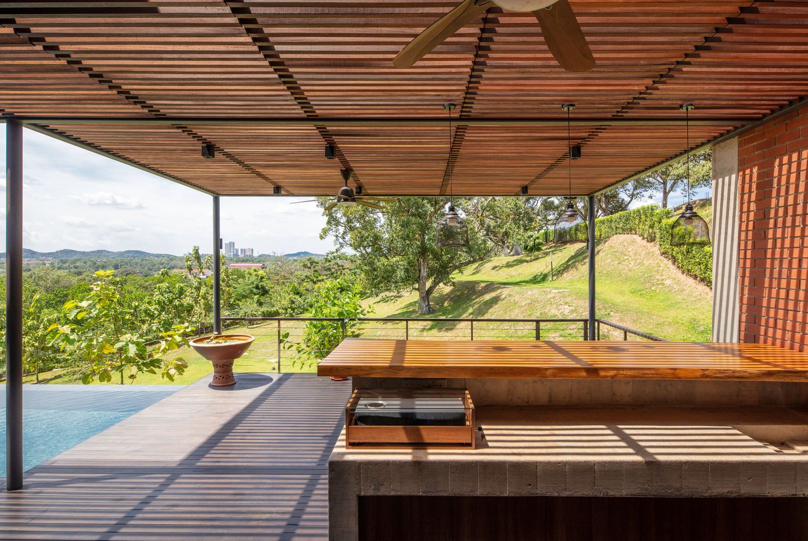 poolside terrace MJ Kanny Architect Tropical style balcony, porch & terrace terrace, patio