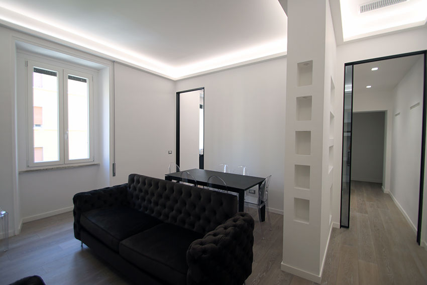 Ristrutturazione di un appartamento di 90 mq, BB1 LABORATORIO DI ARCHITETTURA & DESIGN BB1 LABORATORIO DI ARCHITETTURA & DESIGN Modern living room