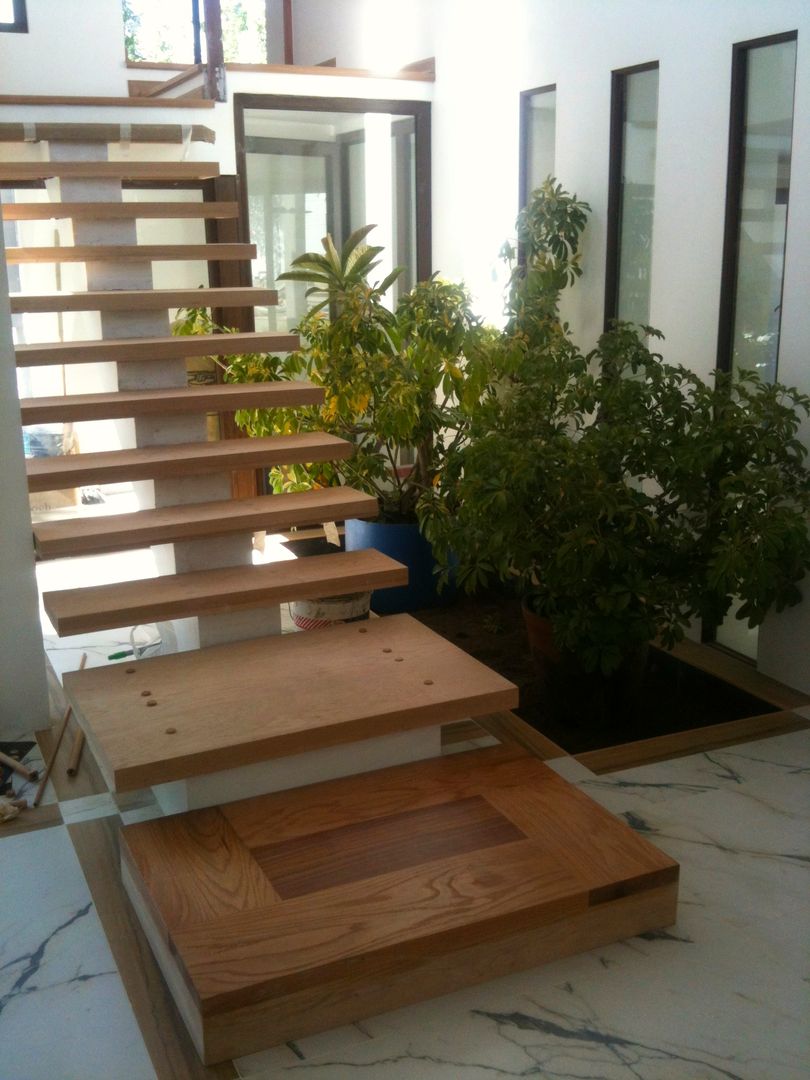 Vivienda en San Carlos de Apoquindo, Olguin Arquitectos Olguin Arquitectos Stairs