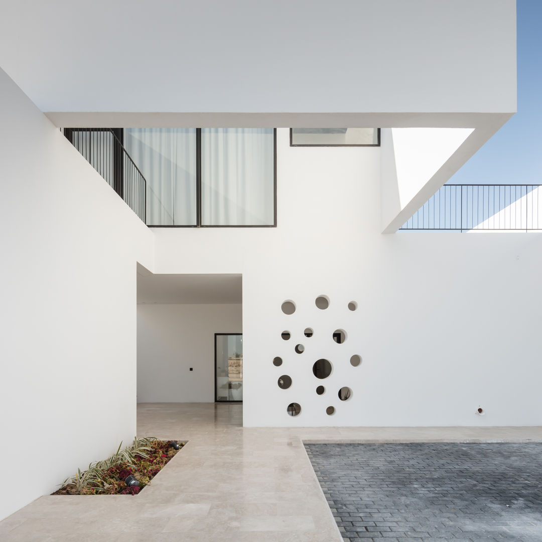 AREIA, Five houses in Kuwait, AAP - ASSOCIATED ARCHITECTS PARTNERSHIP AAP - ASSOCIATED ARCHITECTS PARTNERSHIP Floors Stone