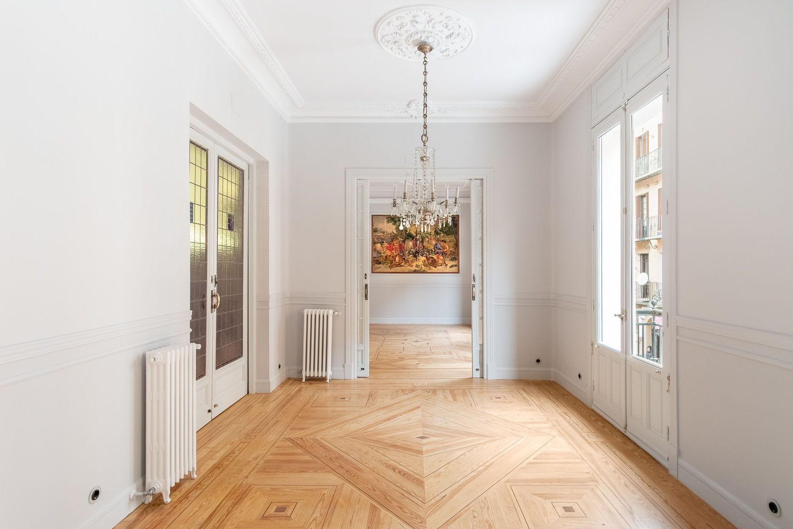 Restauración de una vivienda antigua en Madrid, Arquigestiona Reformas S.L. Arquigestiona Reformas S.L. Living room Solid Wood Multicolored