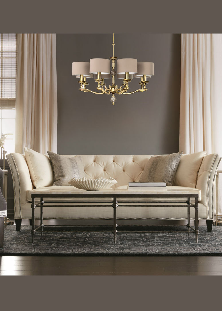 Living room idea with chandelier in brushed brass with beige lamp shade from TIVOLI collection Luxury Chandelier LTD Modern living room Copper/Bronze/Brass living room lighting, living room ceiling lights, luxury table lamps living room