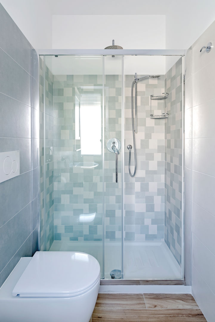 Casa m63, Caleidoscopio Architettura Caleidoscopio Architettura Modern bathroom Tiles