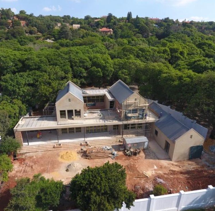 Private home in Westcliff Imagine Architects (Pty) Ltd Single family home Bricks