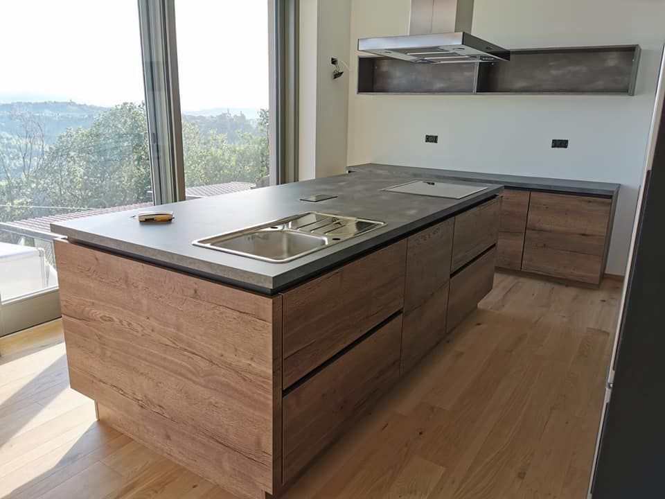 Design italiano Made in Germany, Progetti Abitativi LAB Progetti Abitativi LAB Modern style kitchen Wood Wood effect Storage