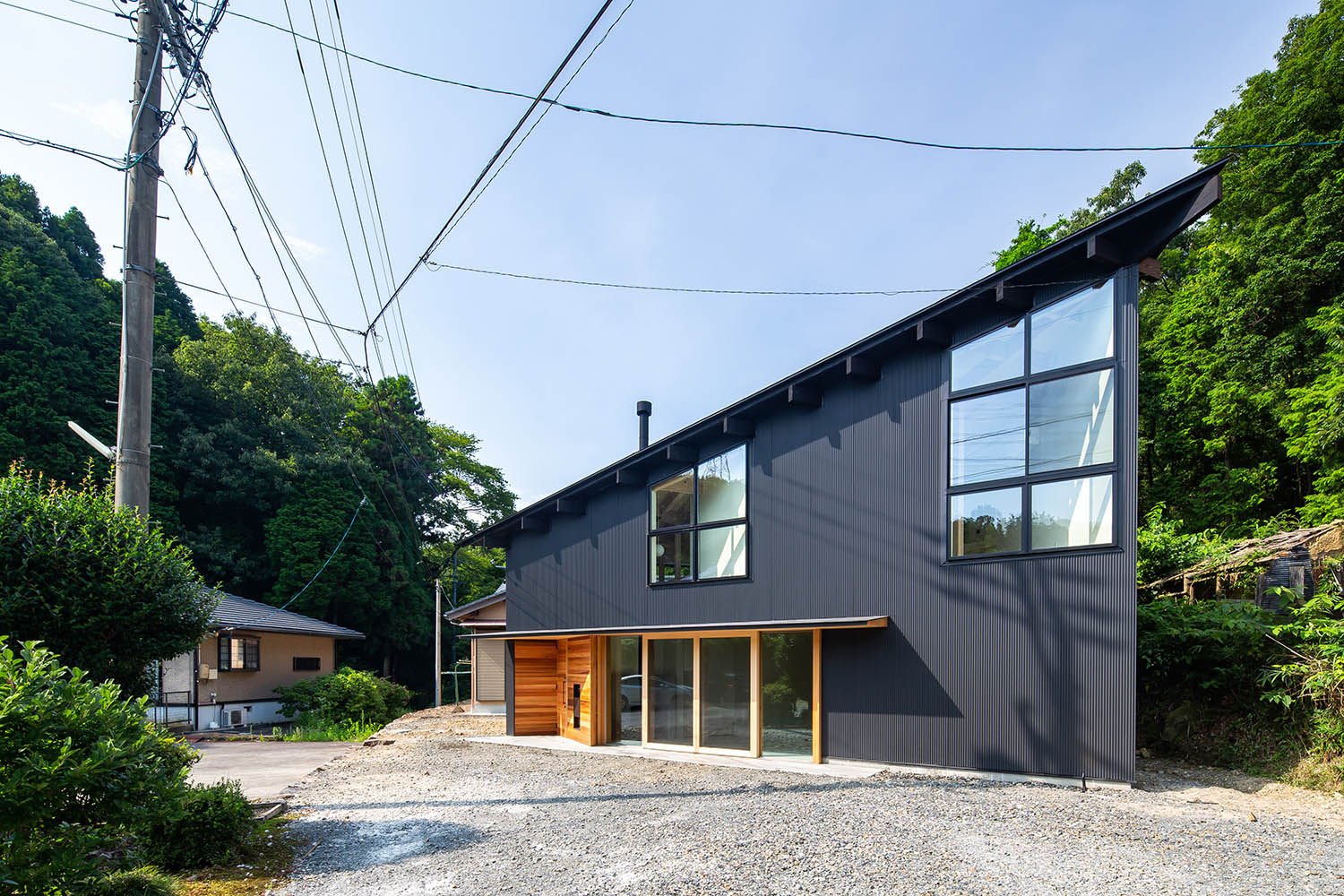 triangle-house, 今井賢悟建築設計工房 今井賢悟建築設計工房 Casas de madeira Ferro/Aço