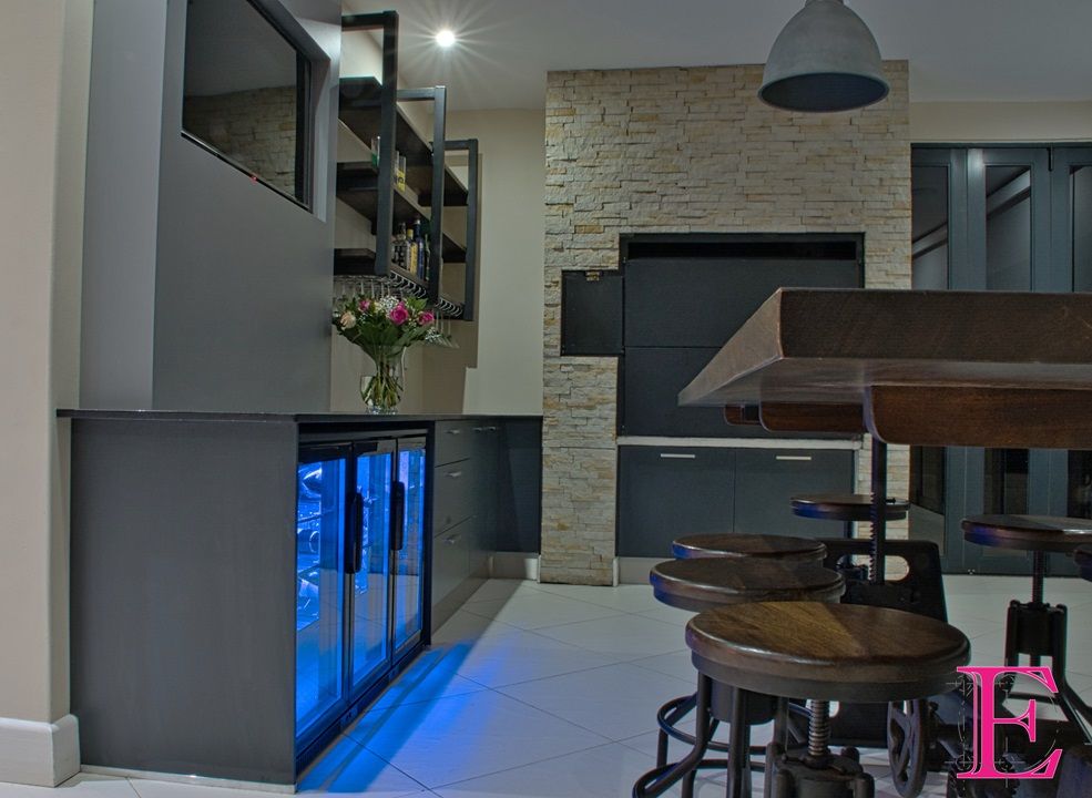 Industrial Home Entertainment / Bar Area Ergo Designer Kitchens & Cabinetry Industrial style wine cellar