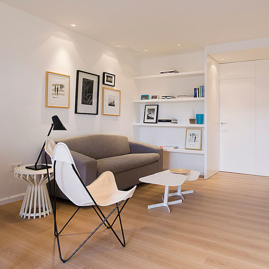 Apartamento en Santa Pola, MANUEL GARCÍA ASOCIADOS MANUEL GARCÍA ASOCIADOS モダンデザインの リビング