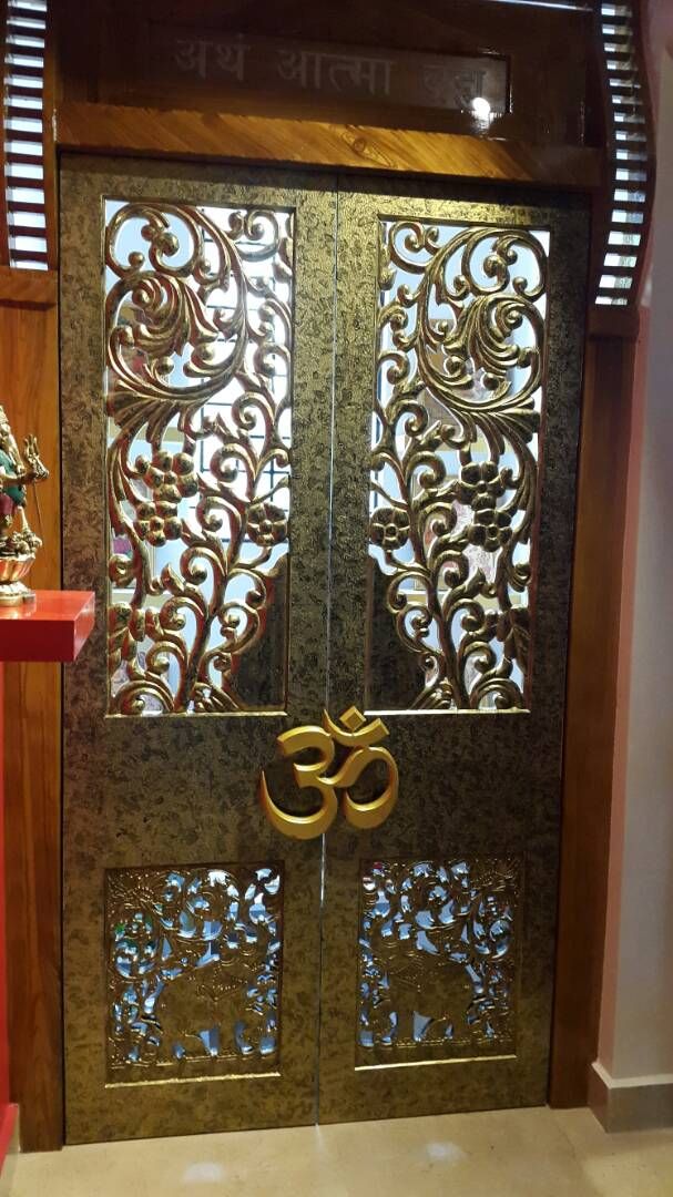 pooja room in all its glory Rnj infratech private limited Modern style doors