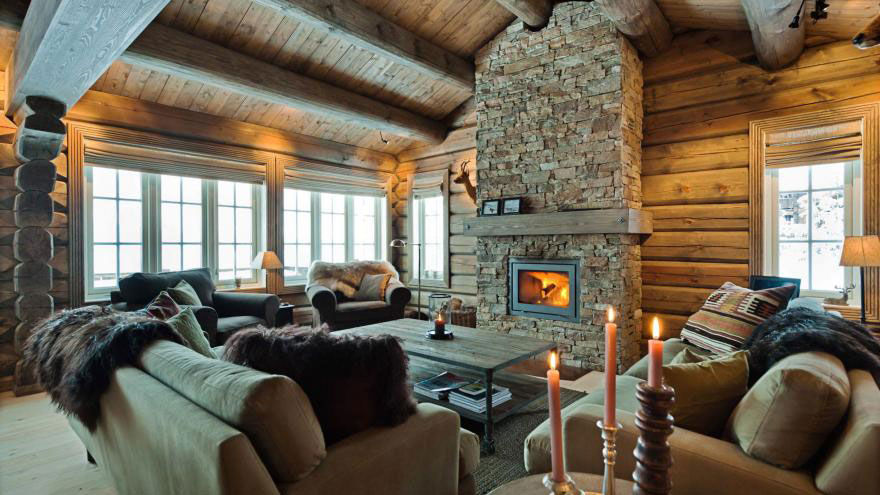 Norwegian log cabin with fireplace Norwegische Blockhäuser Scandinavian style living room Wood Wood effect