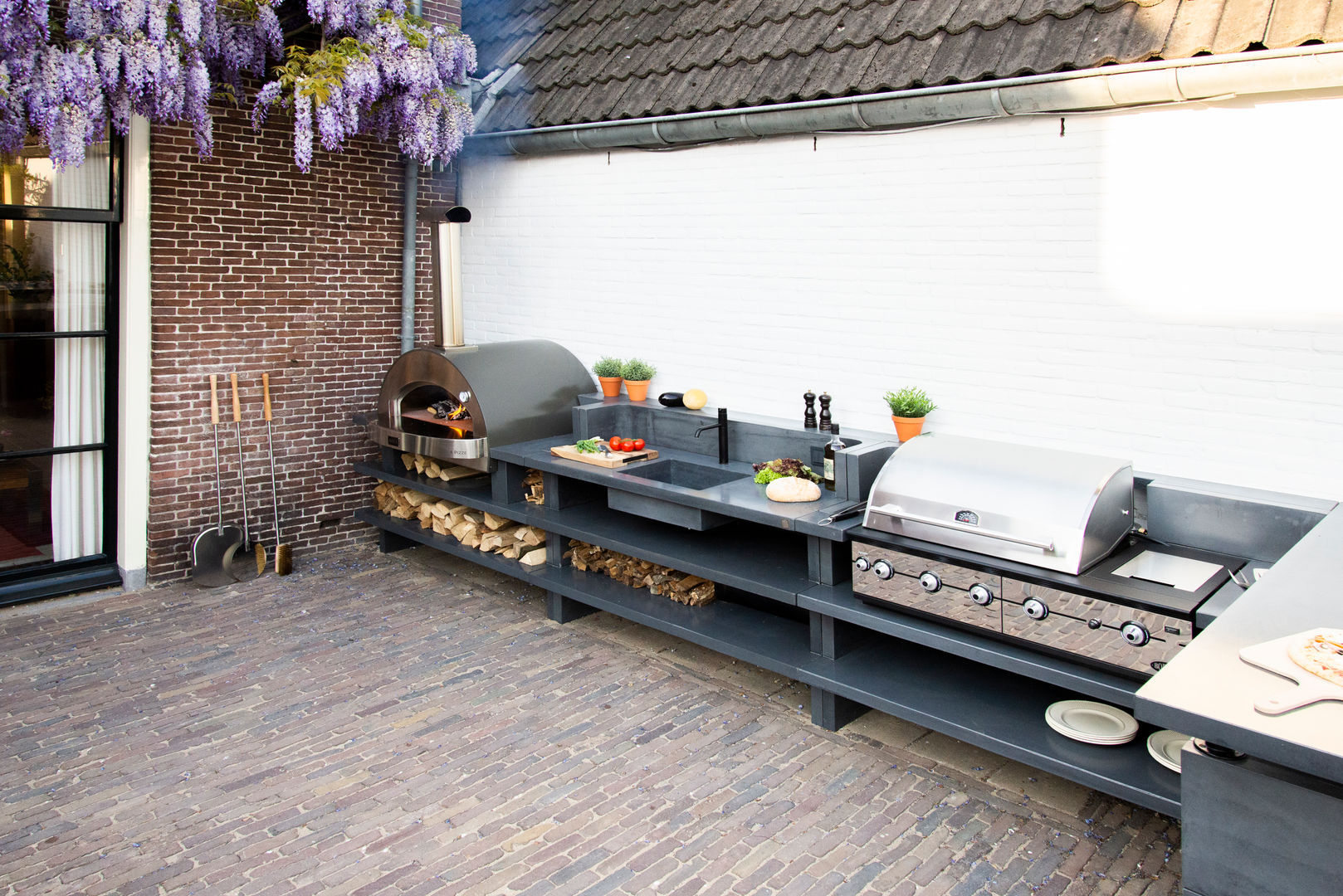 An outdoor kitchen with all the trimmings Alfa Forni Terrace Accessories & decoration