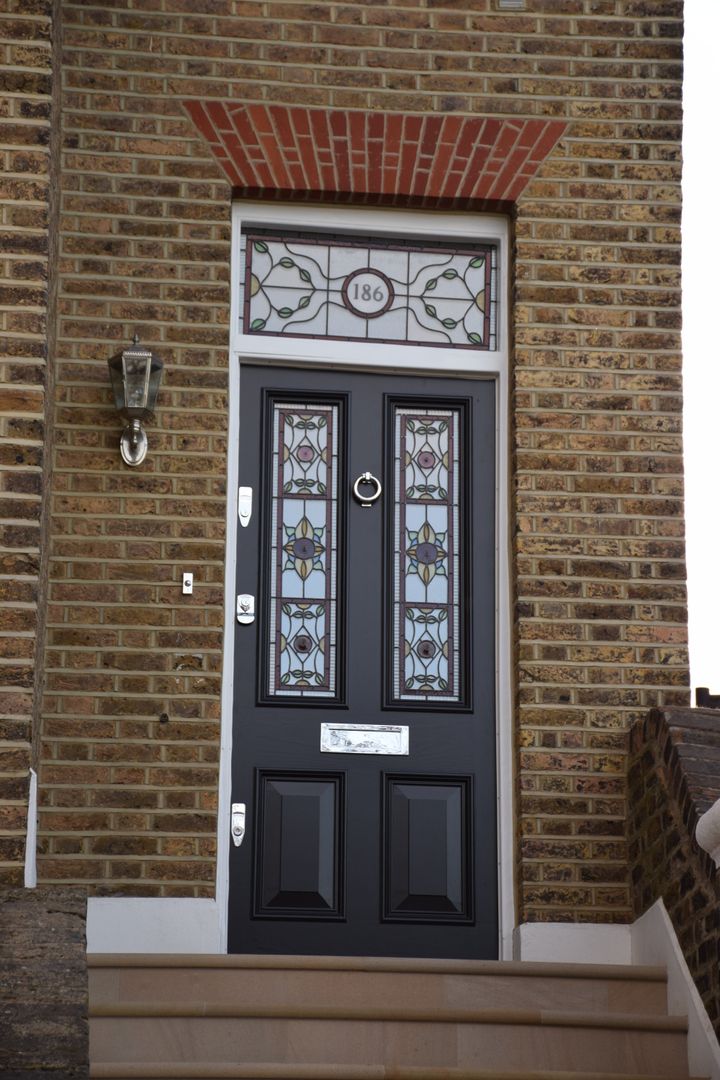 Entrance door Repair A Sash Ltd Porte d’ingresso Legno Effetto legno Entrance door