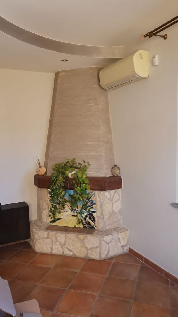 Decorativo Pietra Zen Roma, zona Axa Casalpalocco, Ma.Ni. Ristrutturazioni Ma.Ni. Ristrutturazioni Salas modernas Chimeneas y accesorios