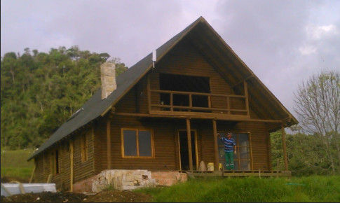 2-DISEÑO Y CONSTRUCCION Y PROMOCION DE CASA CAMPESTRE EN MADERA ROLLIZA homify CABAÑA CAMPESTRE EN MADERA