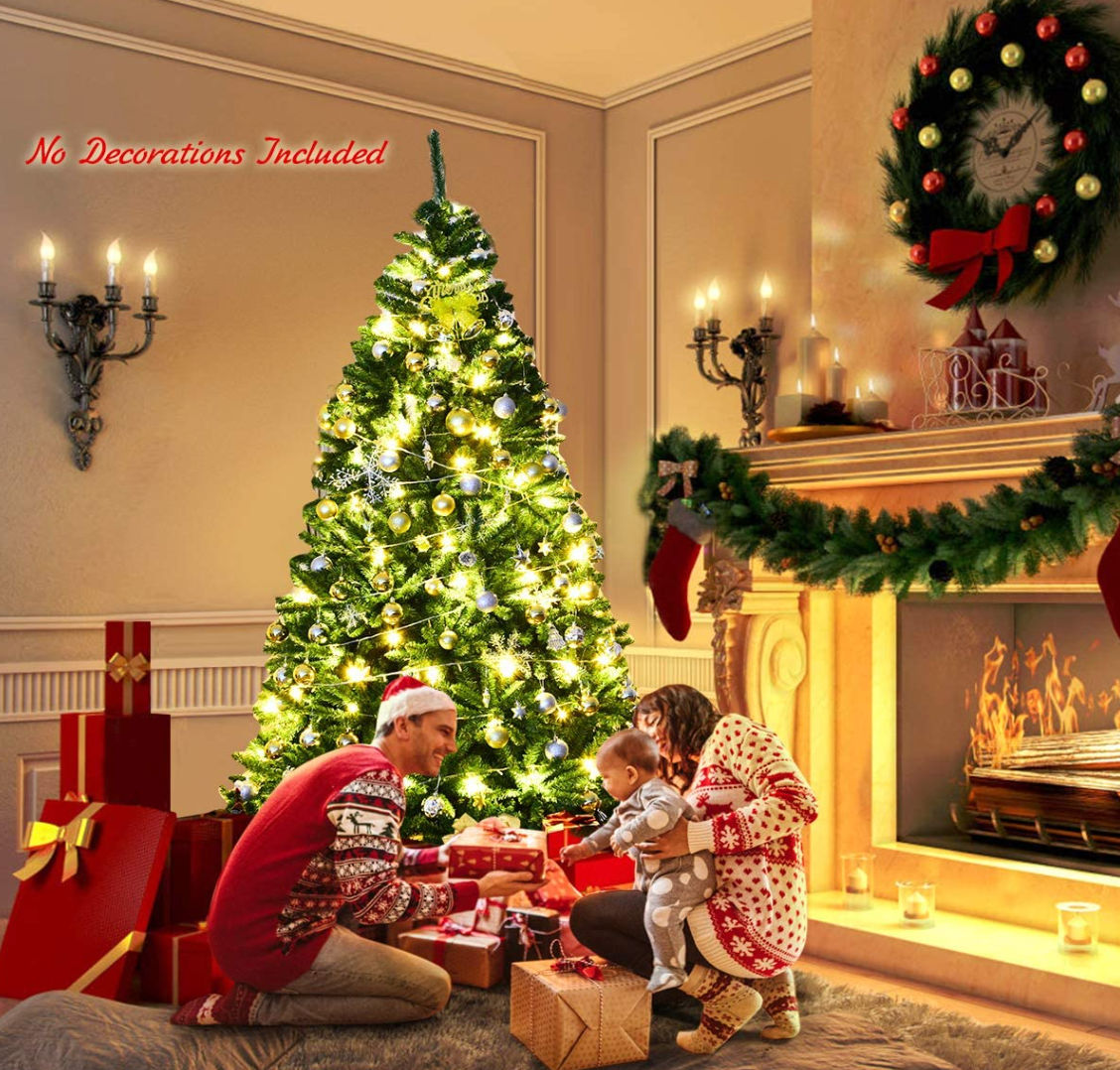 Christmas Tree Press profile homify Landelijke woonkamers kerstboom, kerst versiering, Decoratie, Interieur ontwerp, Kerst ornament, kerst decoratie, Ornament, Kerstmis, Houtachtige plant, Rood