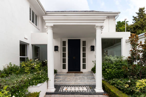 Traditional white architecture and door overlooking the